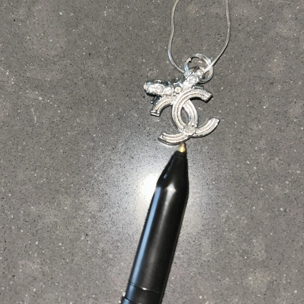 Chanel silver CC bow necklace (hallmark on back)